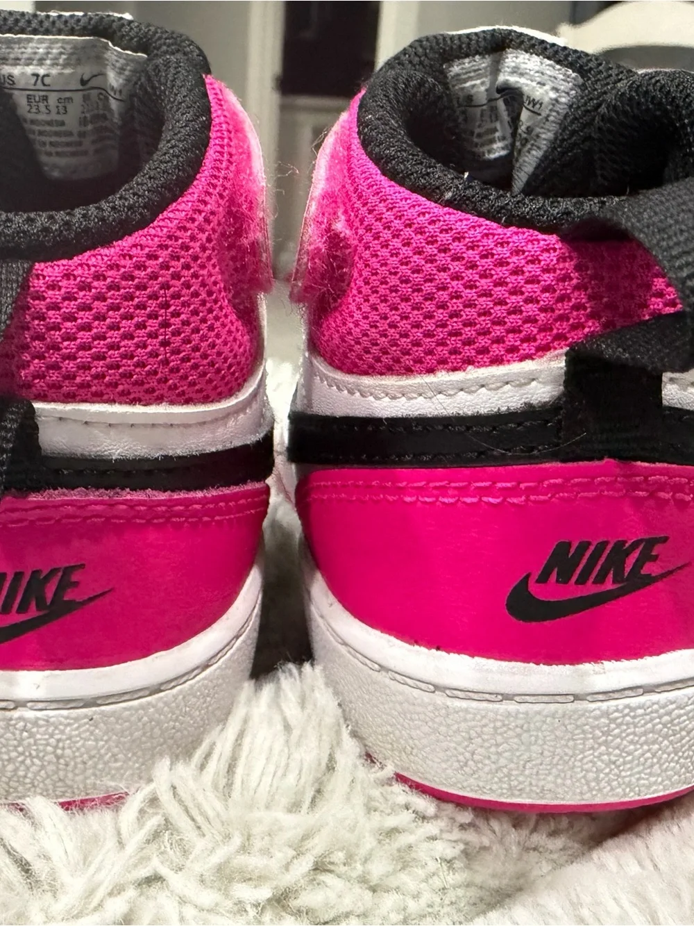 Nike Kids High-Top Sneakers in Black and Hot Pink